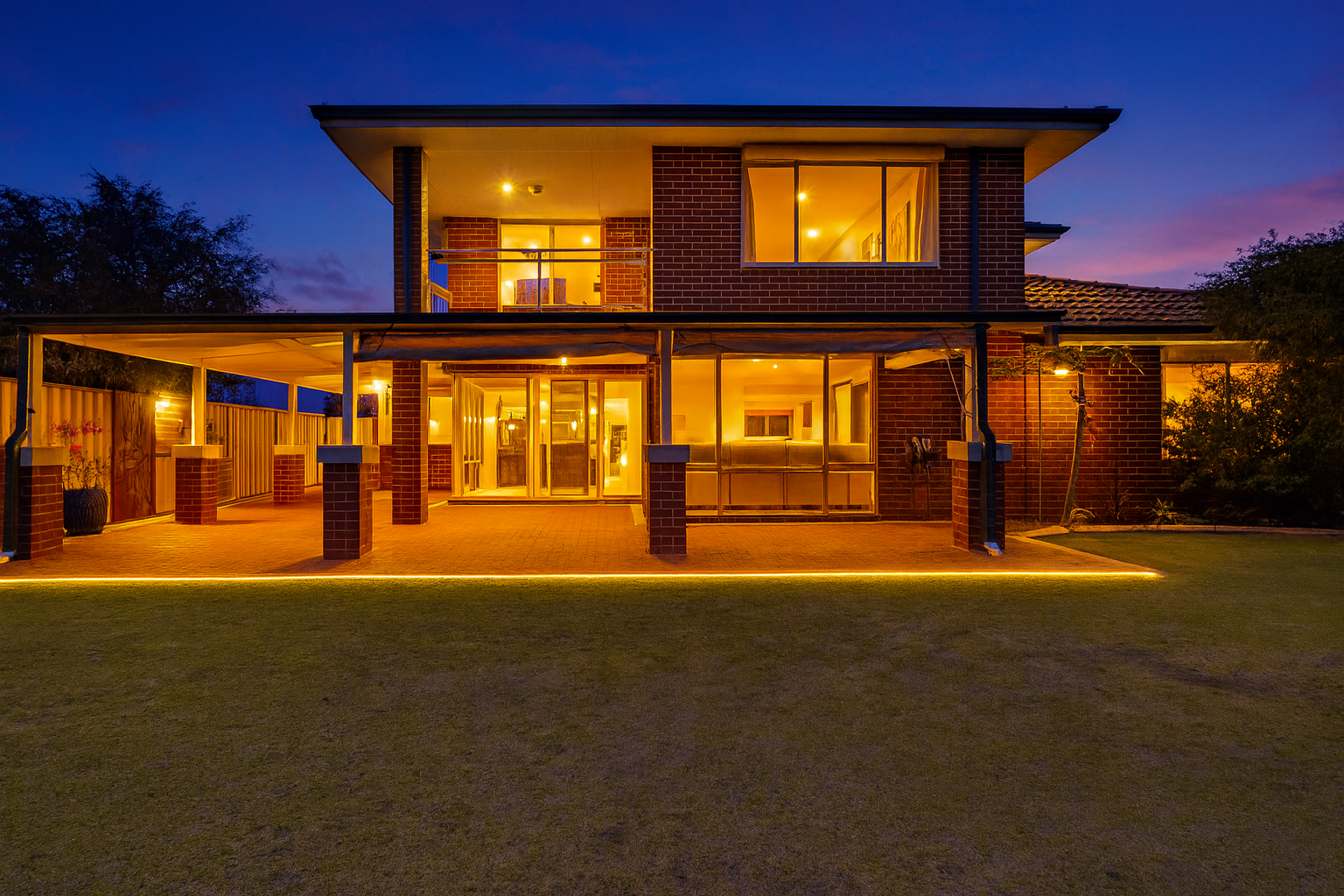 Twilight residential property photograph, AI-enhanced presentation
